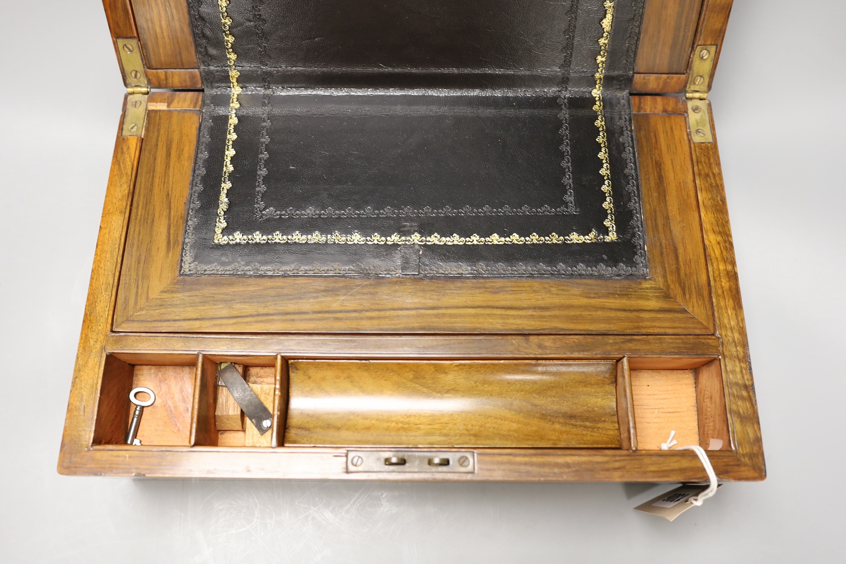 A small early 20th century brass bound mahogany writing slope, 35cm